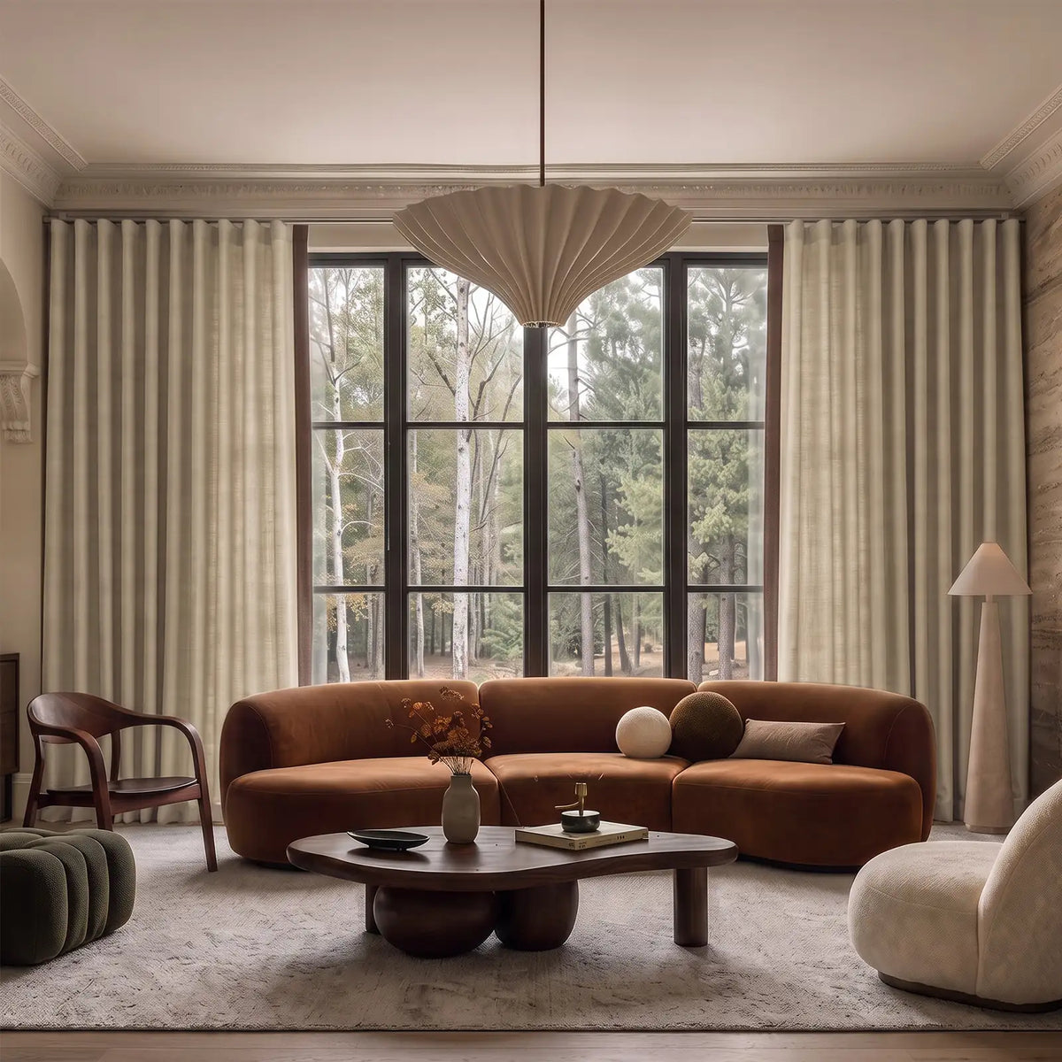 Two-tone ripple fold curtains with a contrasting leading-edge border at a bright window.