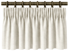 pencil pleat curtains framing a bright window in a neutral interior, in a close material view.